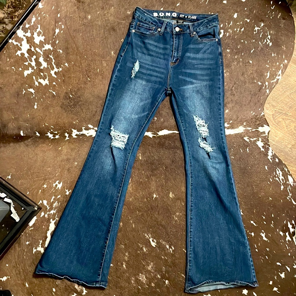 Ripped flare jeans